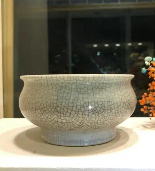 瓷器鉴赏哥釉的开片一定有深浅变化