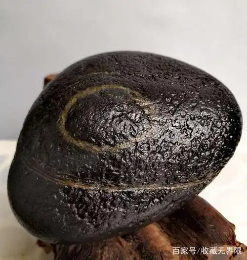 黑珍珠奇石,色泽黝黑,又称黑碳石,象形石曲棍球"10",布景观赏.