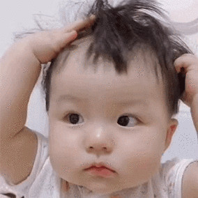 超可爱的丸子妹抓头发表情包