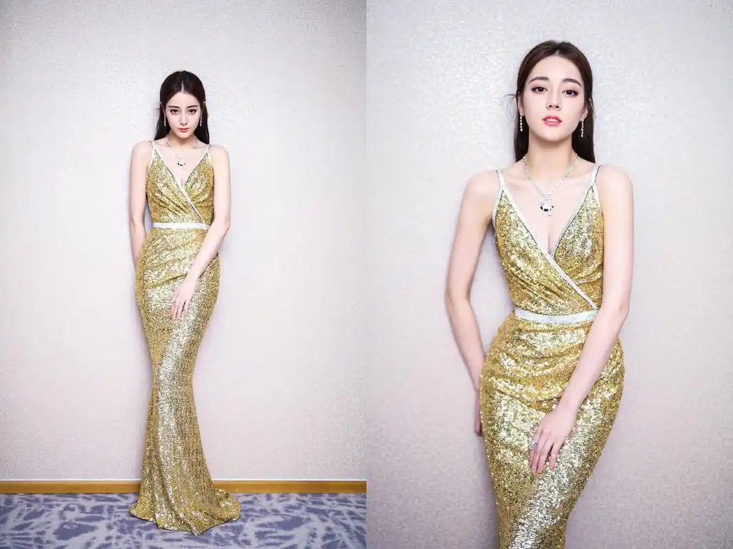 迪丽热巴身穿金色吊带现身yc盛典,这颜值和身材真的是美呆了