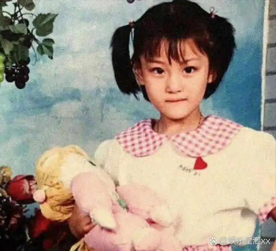 张馨予>童年照,真是从小美到大.[good][good]