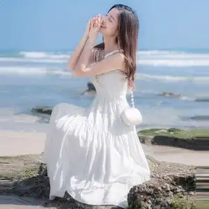 白色连衣裙女夏季吊带裙一字肩大摆长裙沙滩度假脚裸抹胸裙性感裙