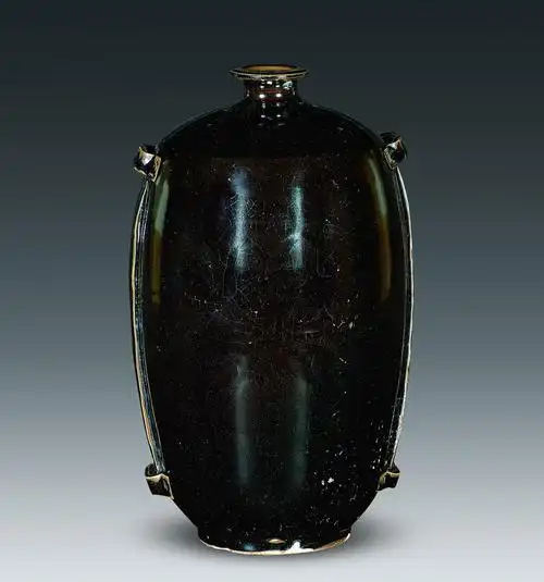 2033辽代定窑黑釉穿带瓶