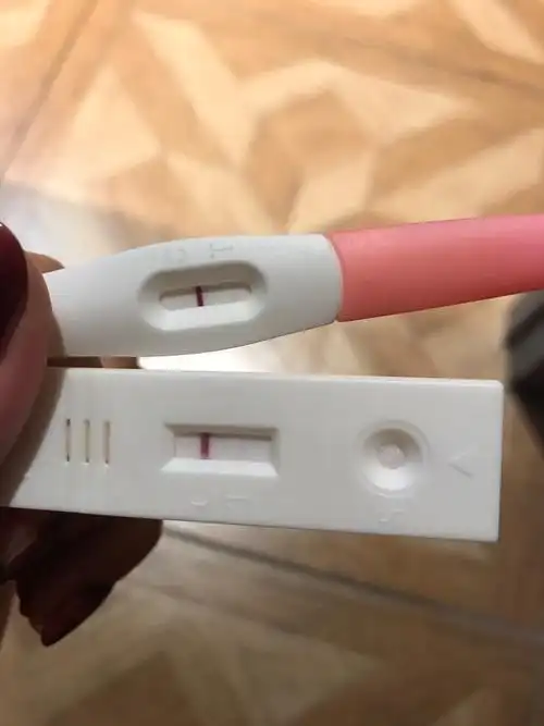 验孕棒一深一浅图片(验孕棒一深一浅后来又来大姨妈了)