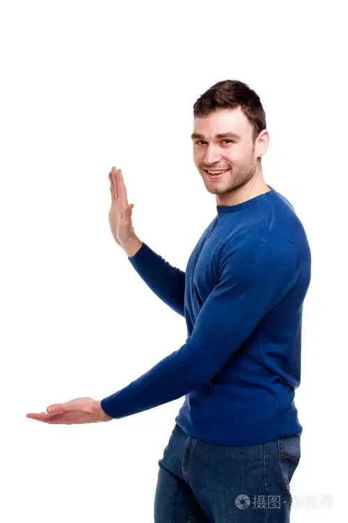 英俊的男人打手势到左边白色上孤立