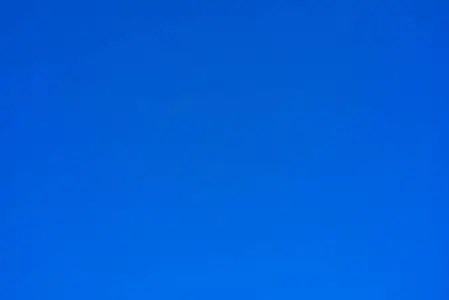 纯净自然空的和纯净的纹理的浅蓝色天空的自然背景或壁纸照片