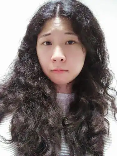 拥有一头自然卷卷头发是一种什么体验?