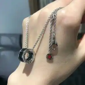 bvlgari/宝格丽小红人慈善款黑陶瓷纯银情侣吊坠男女十字锁骨项链