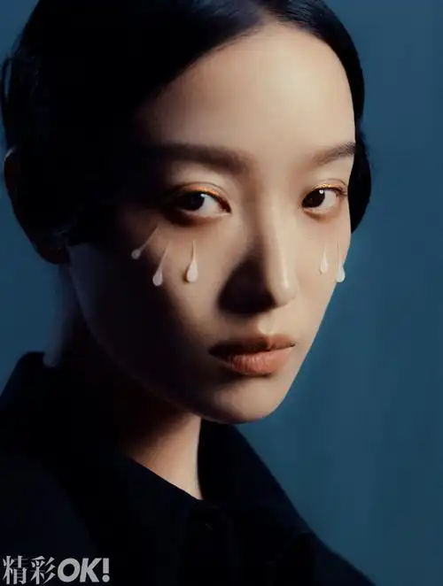 倪妮冰泪波纹盘发封面