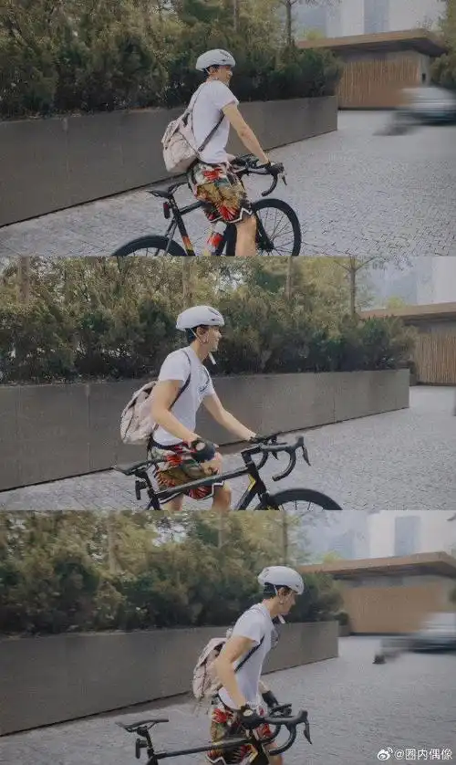 吴磊最新骑车侧拍,好熟悉的花短裤造型,又骑车上班了